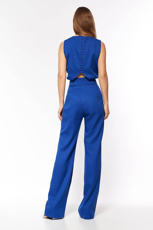 Jumpsuit azzurra con chiusura a bottoni e dettaglio triangolare basso sul dorso 164550 Nife